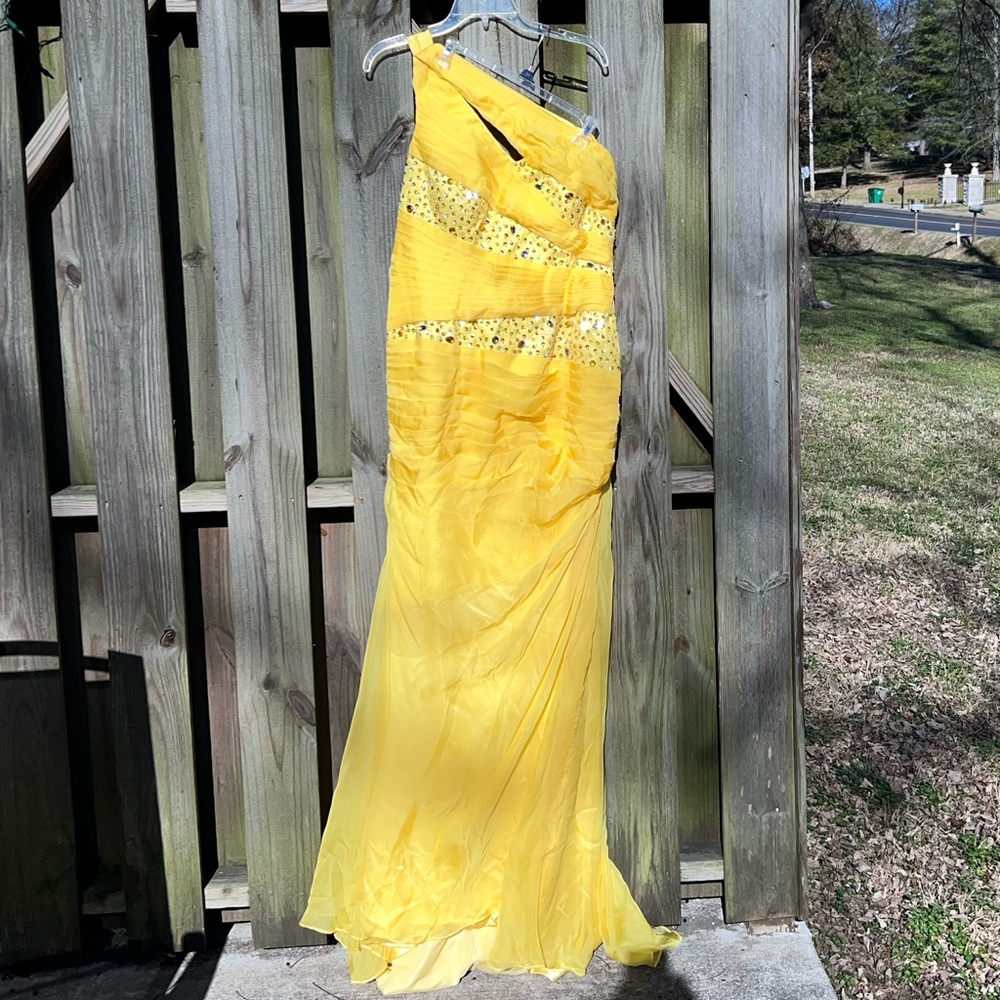 Judy Bridal one shoulder yellow gown.